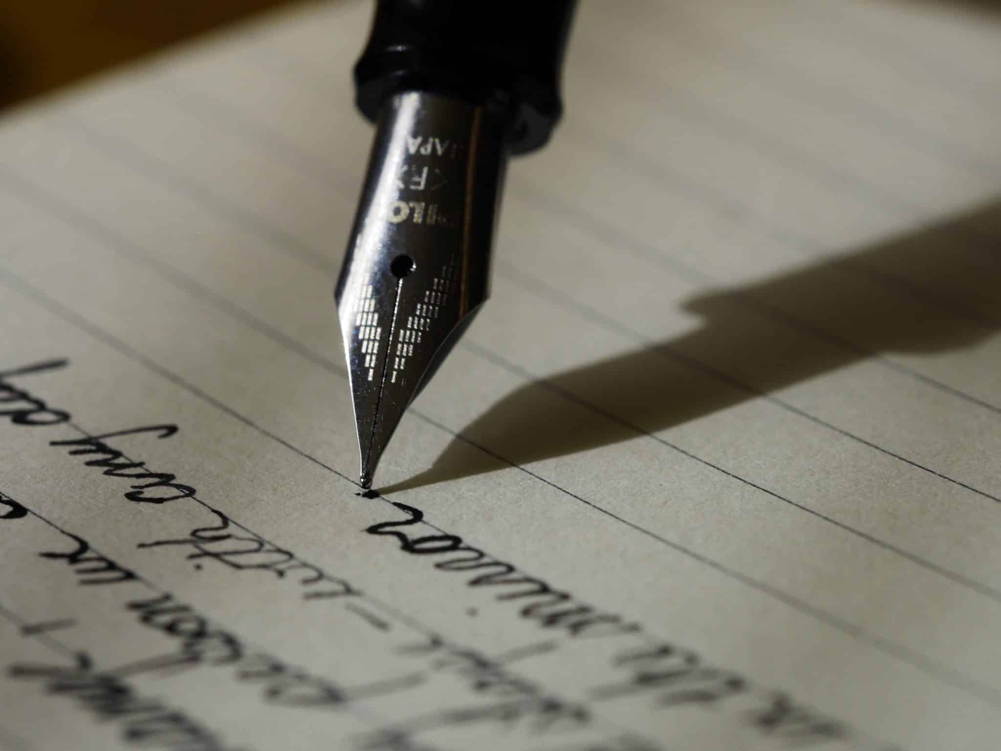 lawyer writing how much does a divorce cost​ in the uk